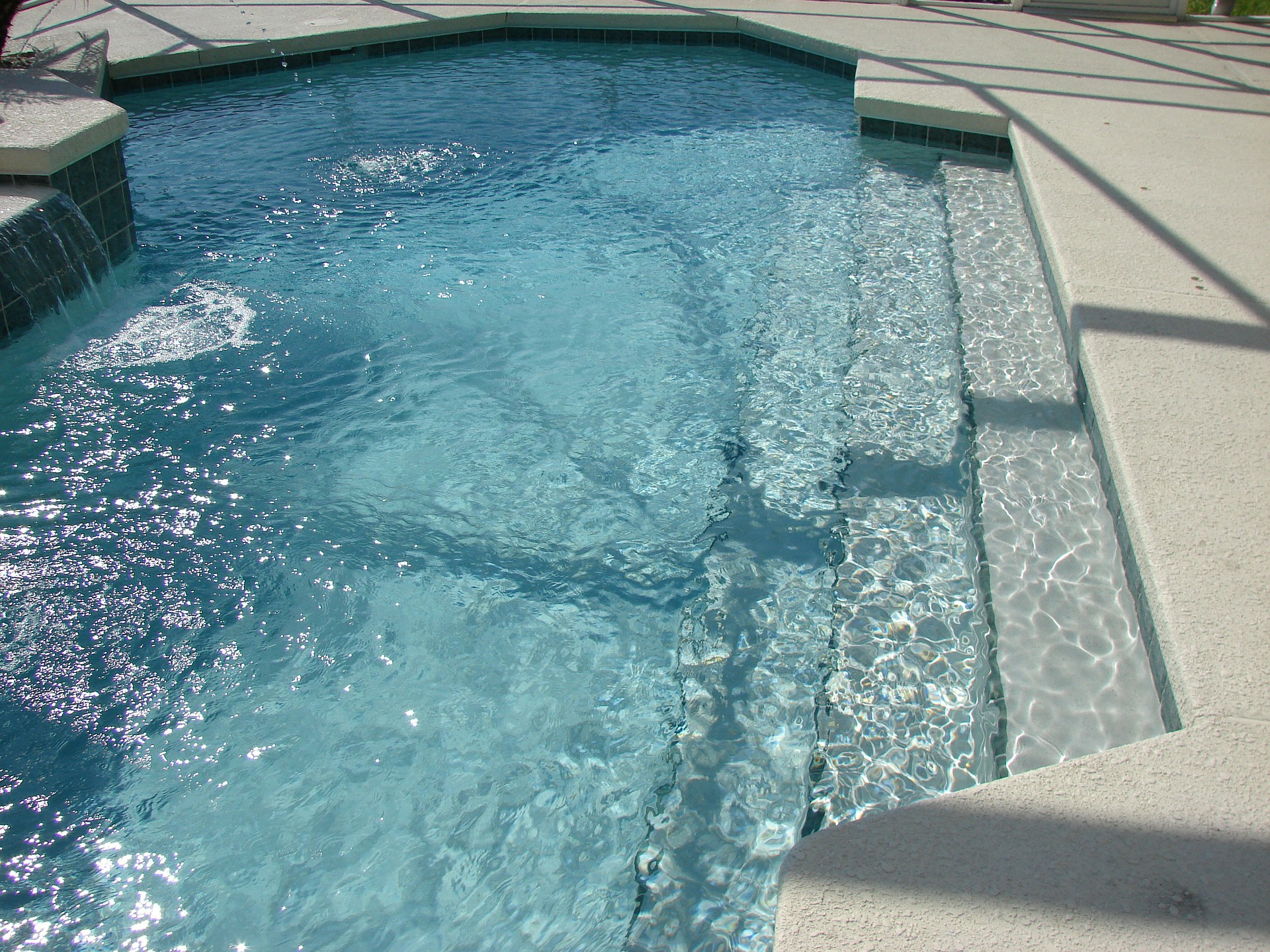 steps into pool